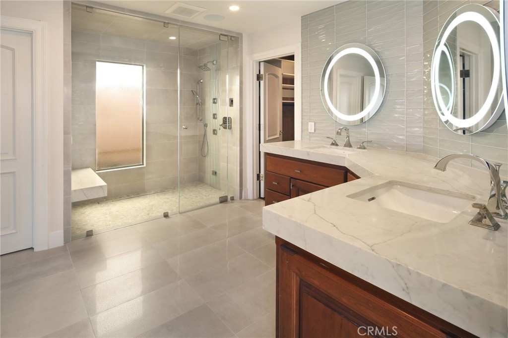 33821 Via Capri Avenue Dana Point, CA 92629 - Photo 10 of 42 LAVISH NEW PRIMARY BATH WITH QUARTZITE COUNTERS & STEAM SHOWER