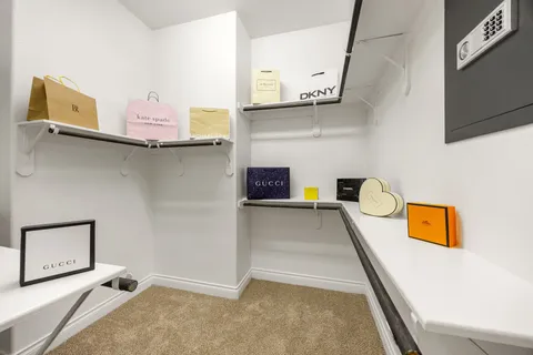 a view of storage and utility room with a sink