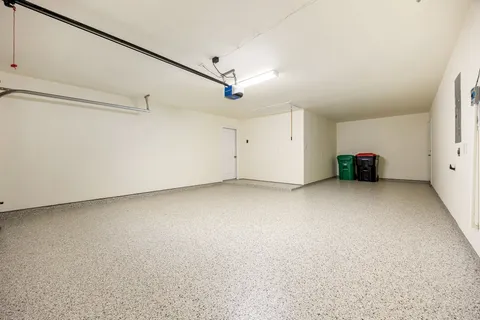 a view of a livingroom with furniture and a ceiling fan