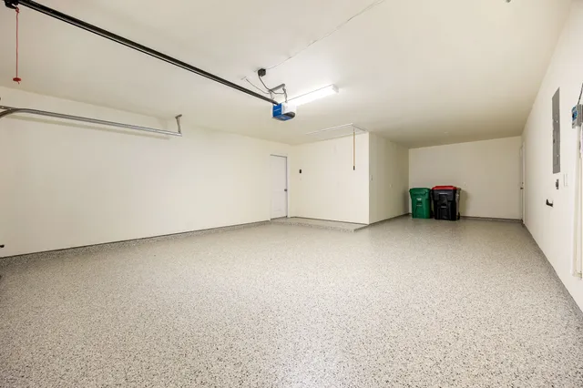 a view of a livingroom with furniture and a ceiling fan