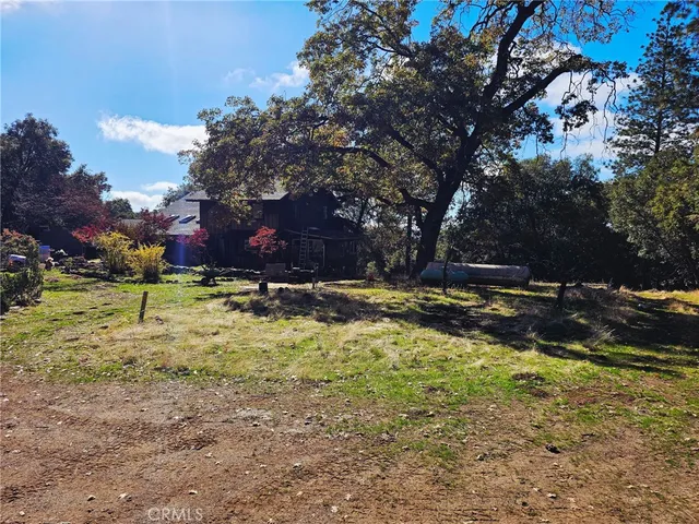 a view of swimming pool with a yard