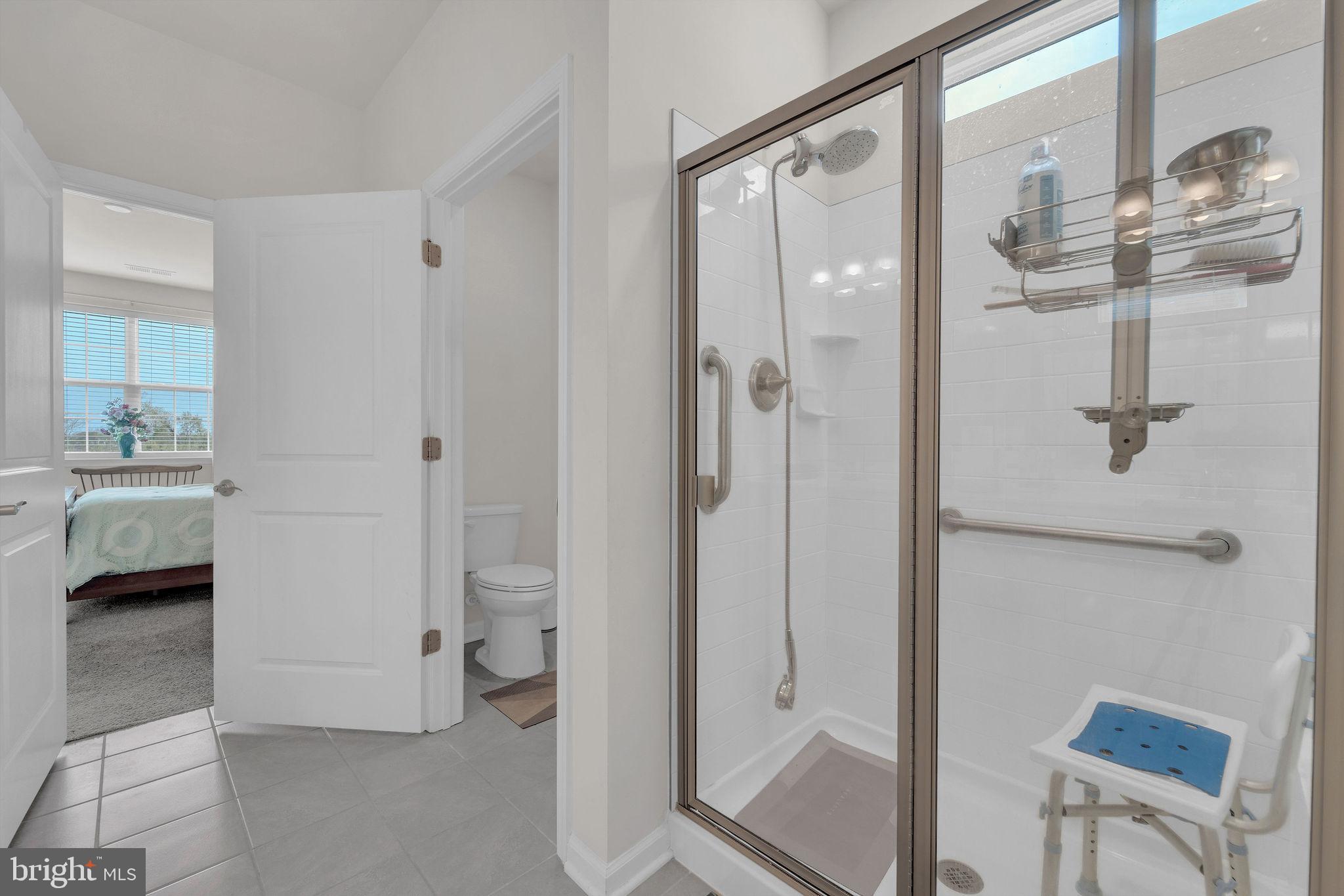 31 Walton Way Delanco, NJ 08075 - Photo 15 of 30 a bathroom with a glass door shower and a toilet