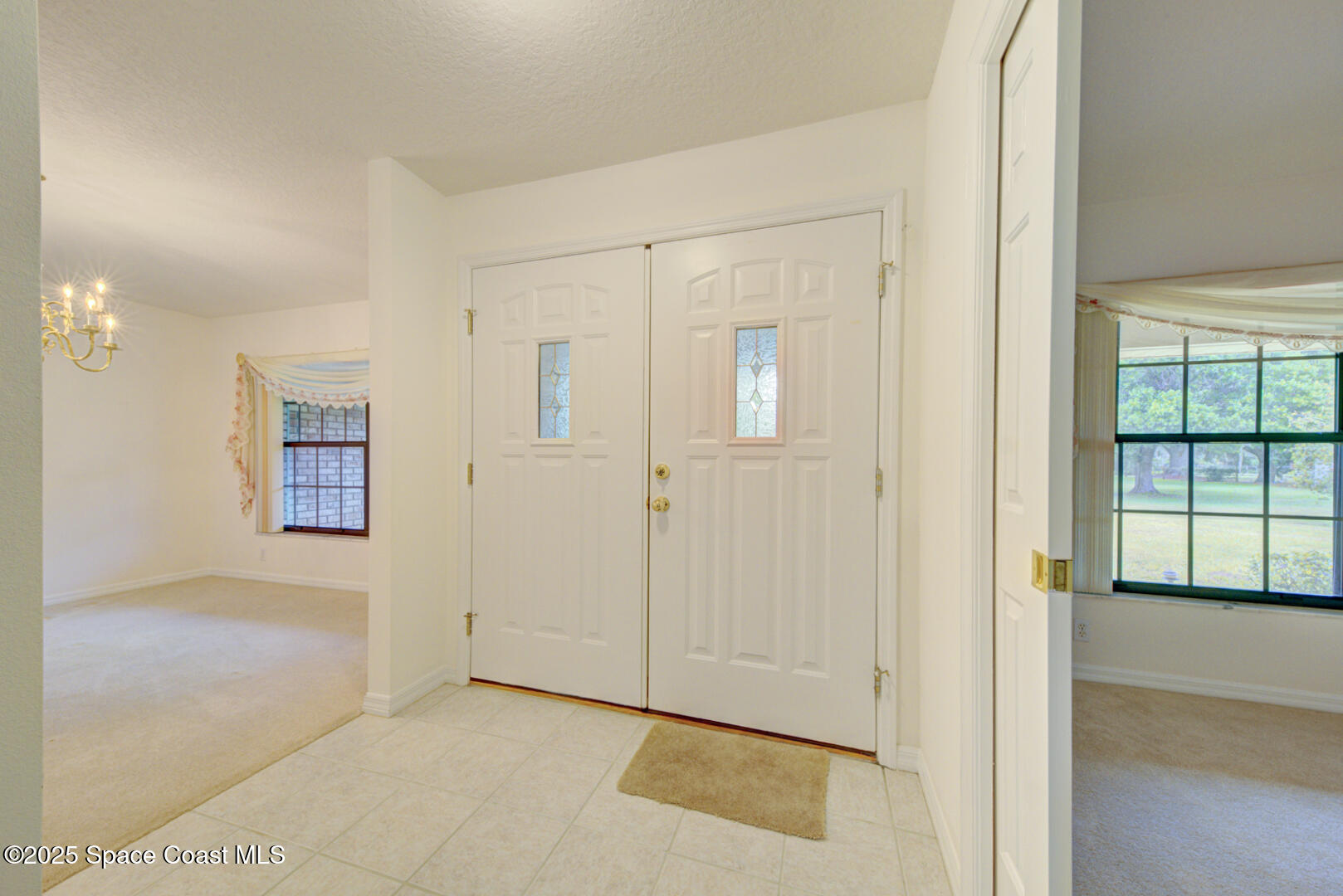 3105 Diamond Road Titusville, FL 32796 - Photo 13 of 81 foyer & dining room