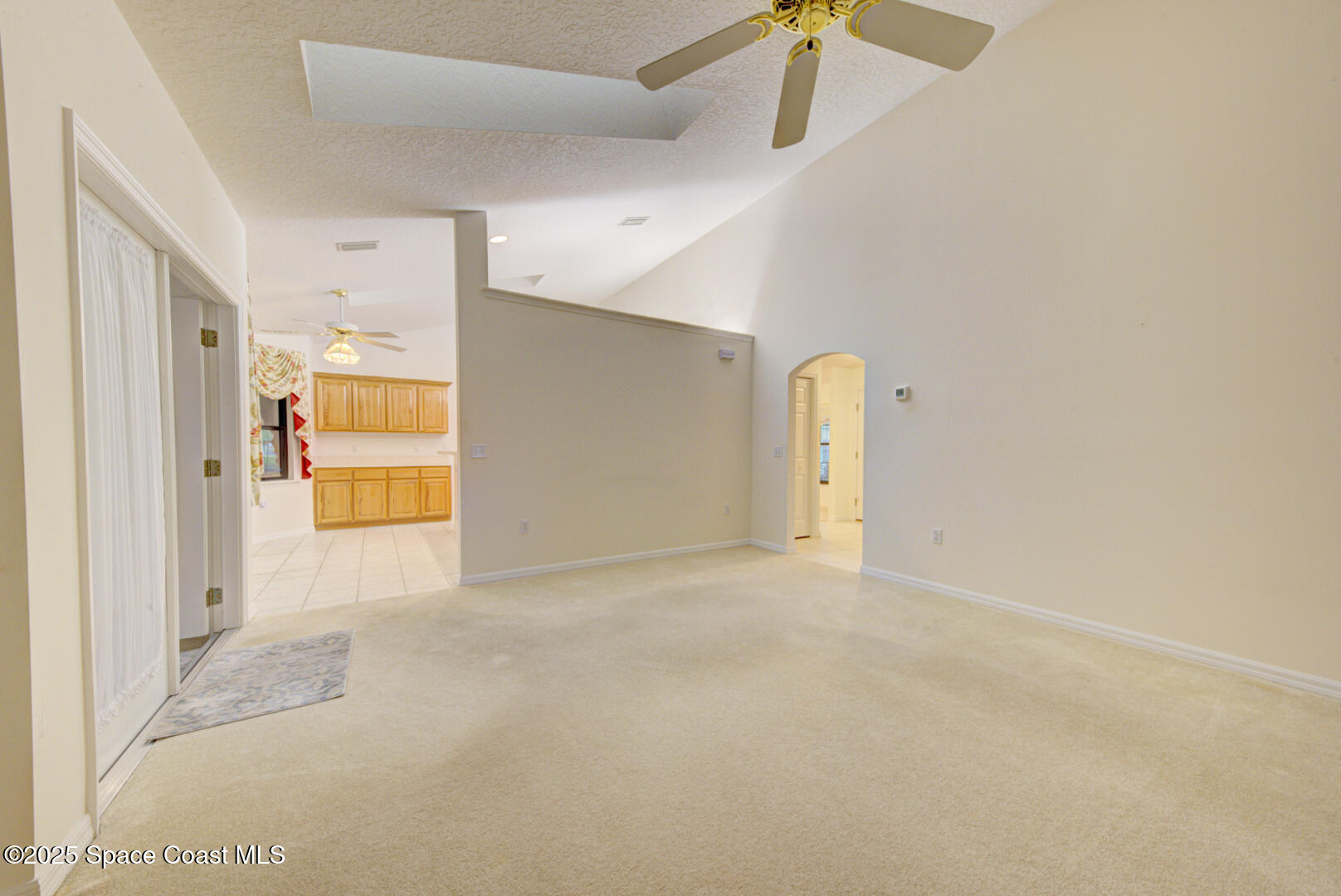 3105 Diamond Road Titusville, FL 32796 - Photo 34 of 81 a view of a livingroom with a furniture and a ceiling fan