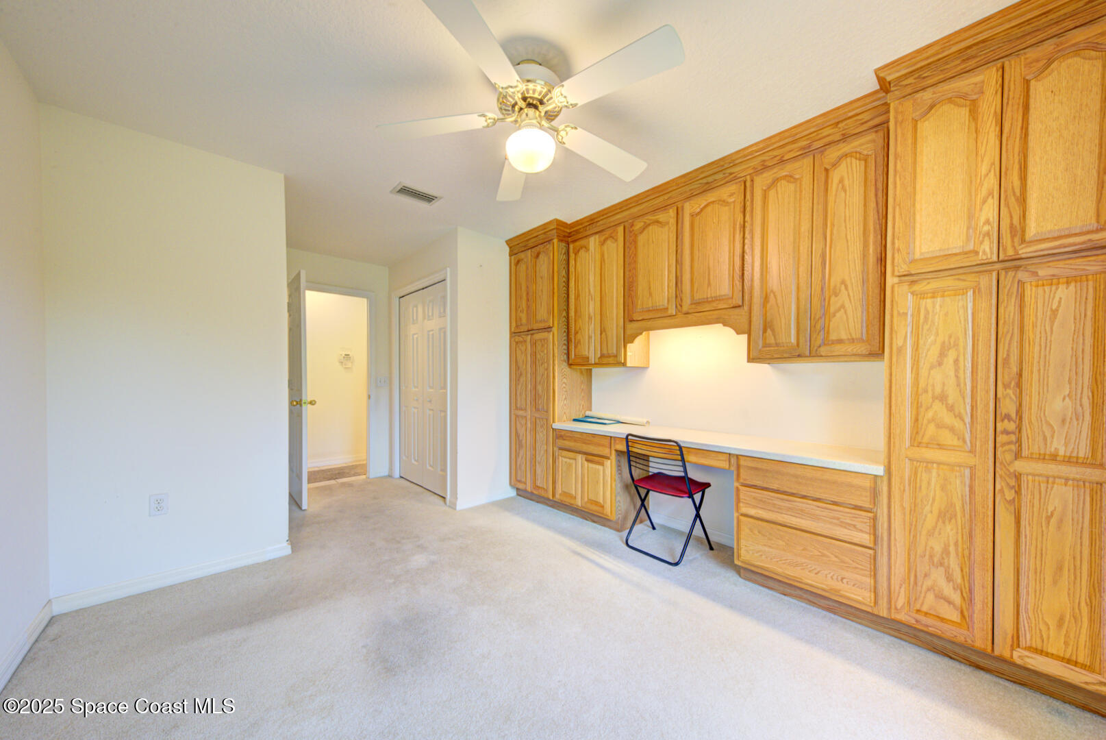3105 Diamond Road Titusville, FL 32796 - Photo 44 of 81 a view of an empty room with a window