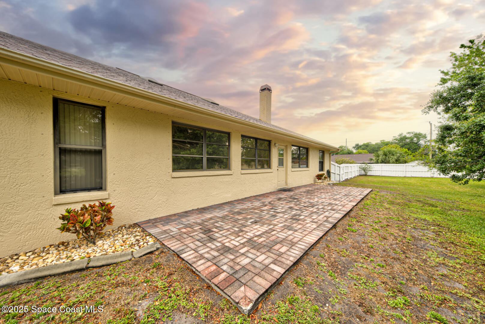 3105 Diamond Road Titusville, FL 32796 - Photo 54 of 81 a front view of a house with a yard