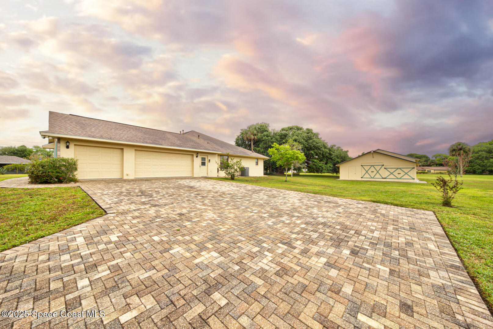 3105 Diamond Road Titusville, FL 32796 - Photo 6 of 81 a view of a house with a yard and a large tree