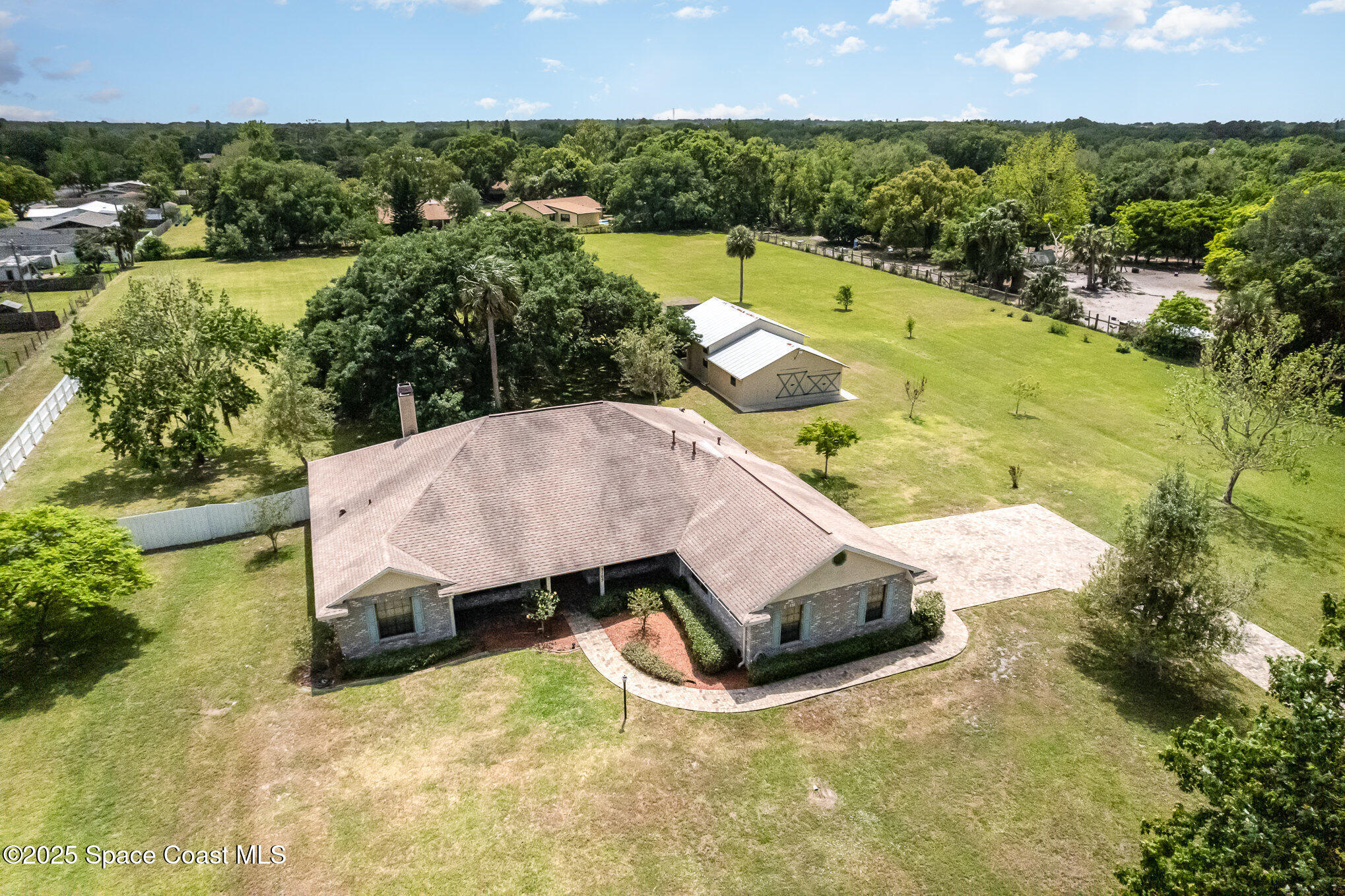 3105 Diamond Road Titusville, FL 32796 - Photo 66 of 81 an aerial view of a house with yard swimming pool and outdoor seating