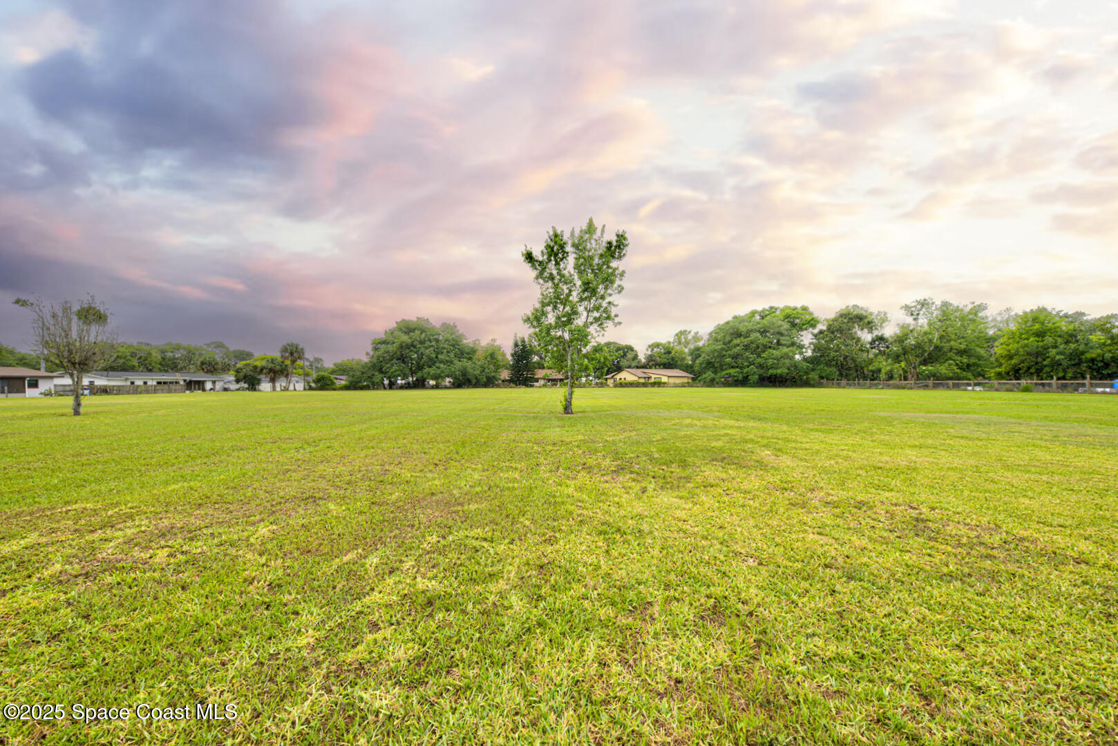 3105 Diamond Road Titusville, FL 32796 - Photo 69 of 81 a view of a field with an ocean