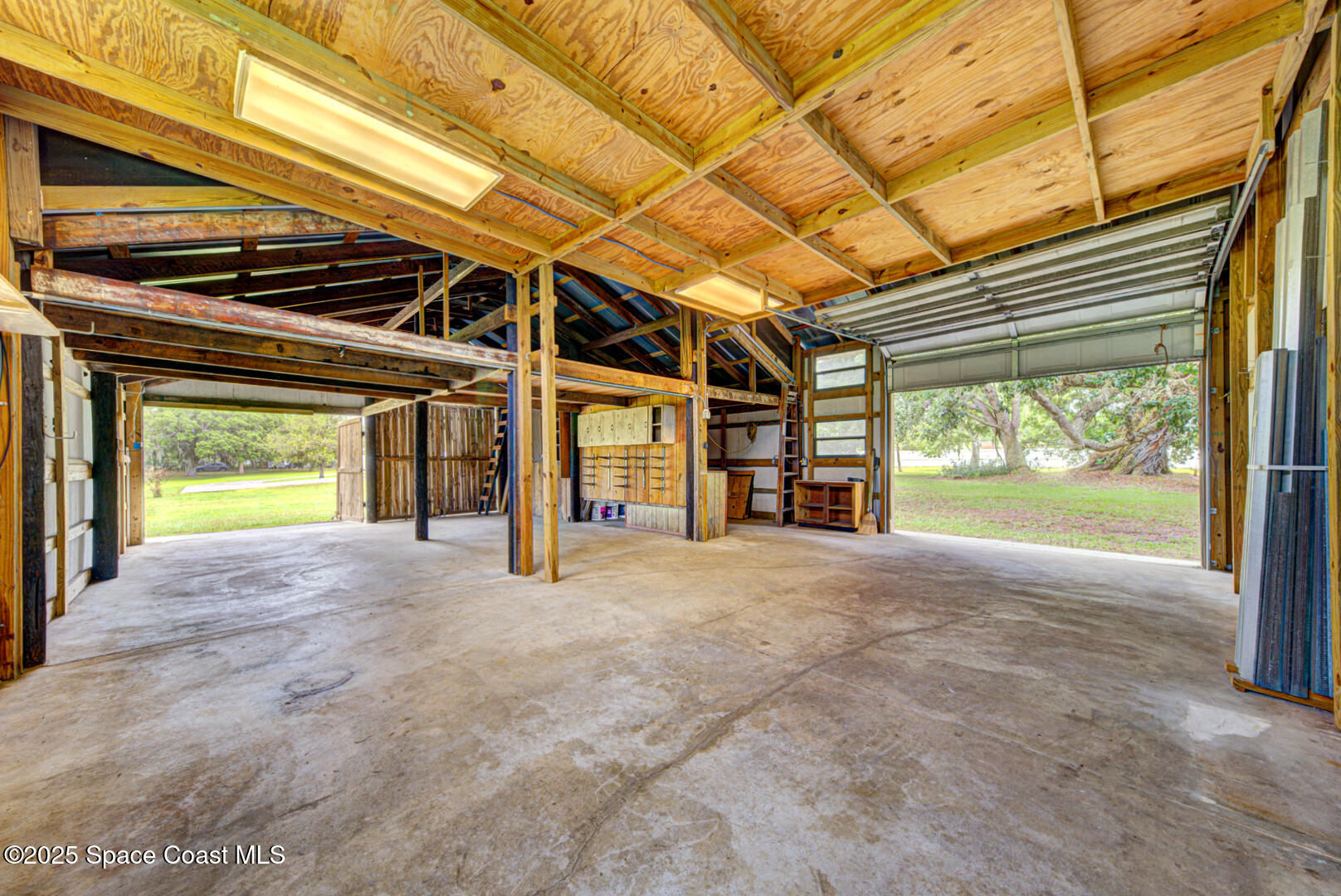 3105 Diamond Road Titusville, FL 32796 - Photo 75 of 81 barn with garage door