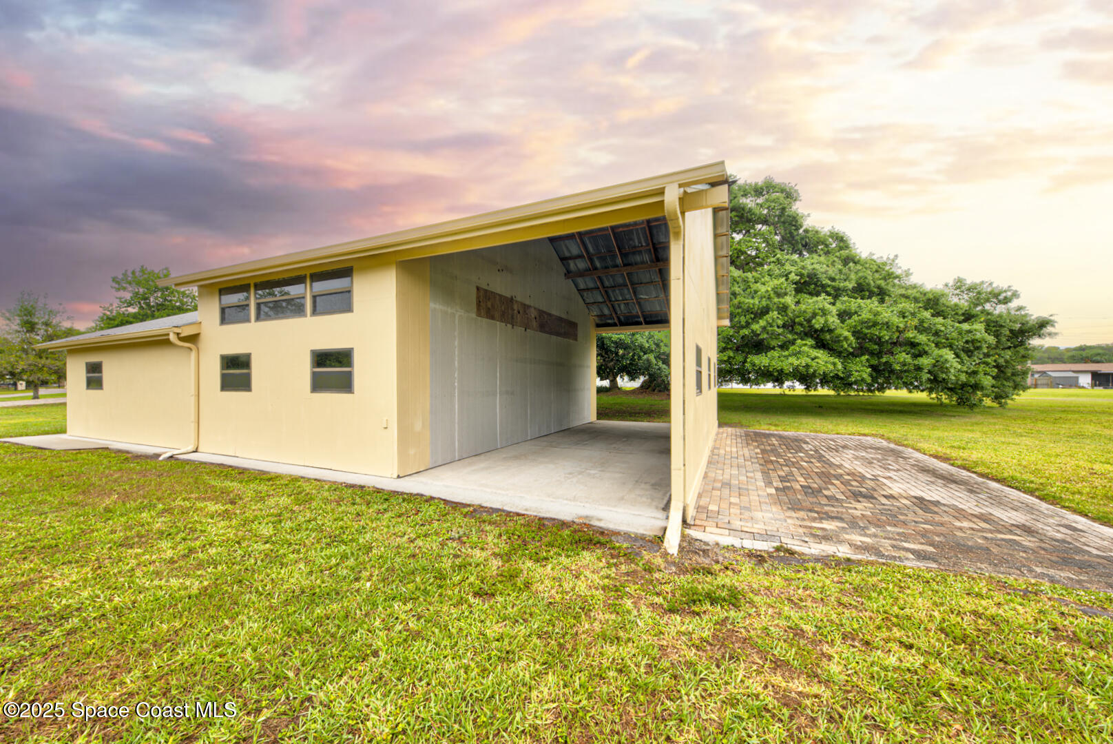 3105 Diamond Road Titusville, FL 32796 - Photo 76 of 81 a view of a house with backyard and garden