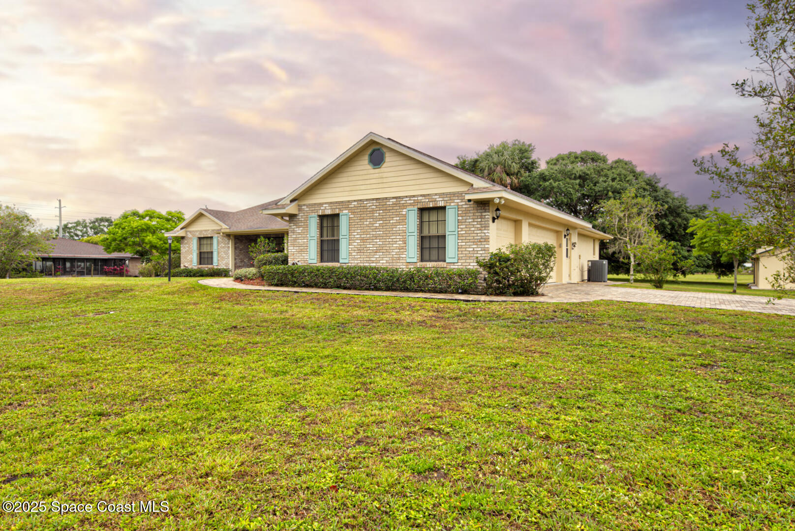3105 Diamond Road Titusville, FL 32796 - Photo 78 of 81 a front view of house with yard and lake view