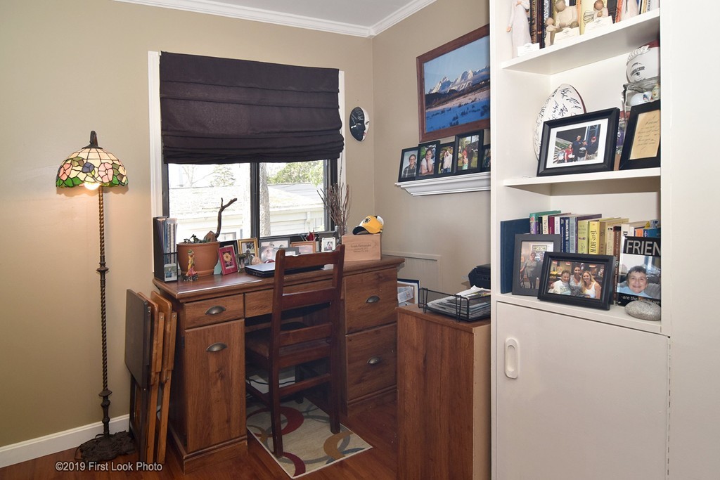 301 Bulgarmarsh Road, Unit F7 Tiverton, RI 02878 - Photo 4 of 30 a room with a desk and chair