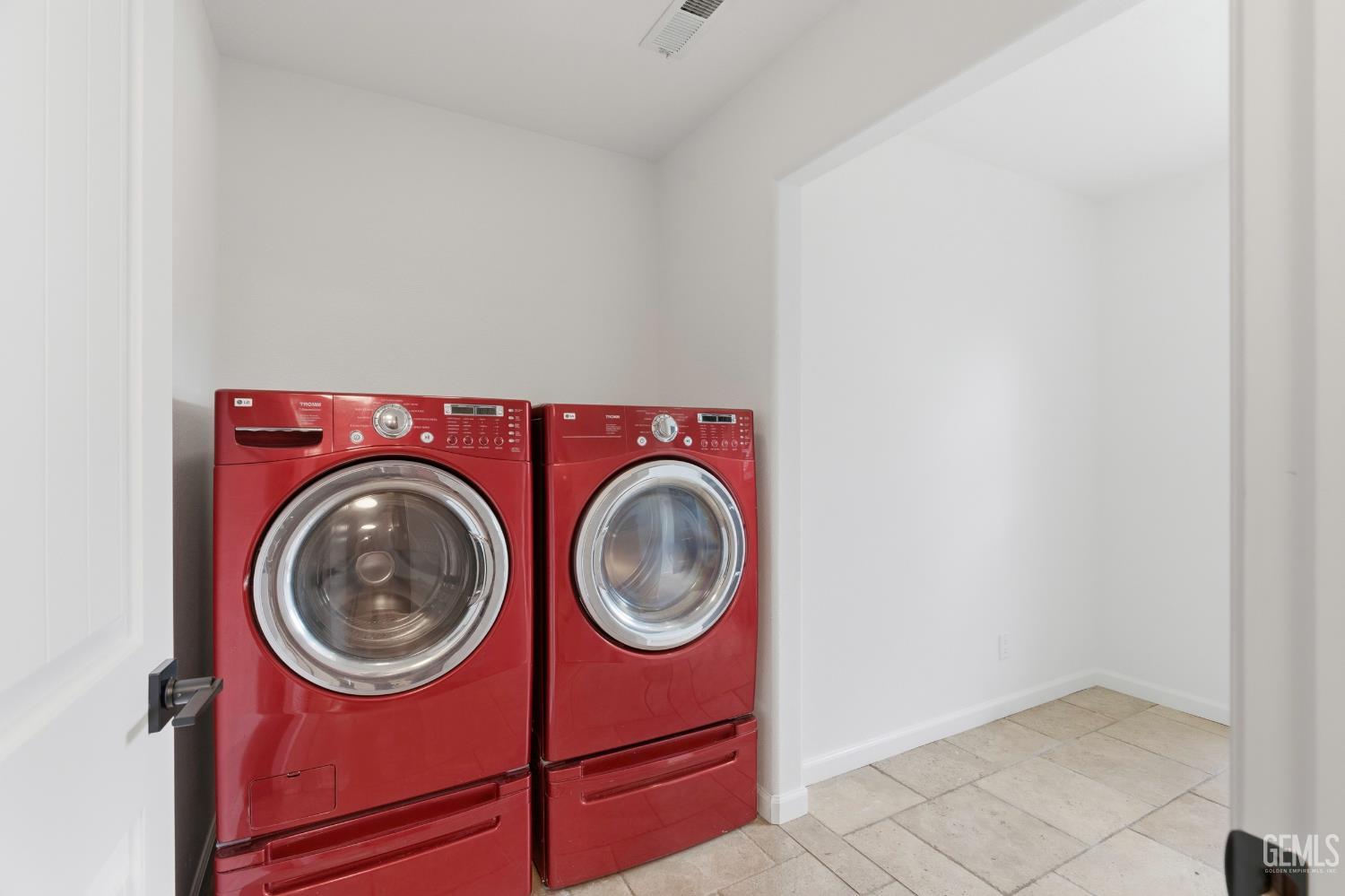 Undisclosed Address Springville, CA 93265 - Photo 21 of 62 a utility room with dryer and washer