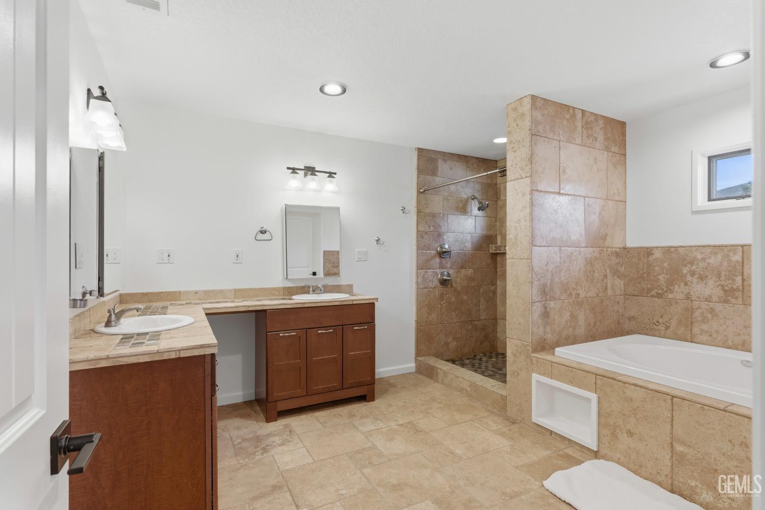 Undisclosed Address Springville, CA 93265 - Photo 33 of 62 a spacious bathroom with a bathtub shower sink mirror and toilet