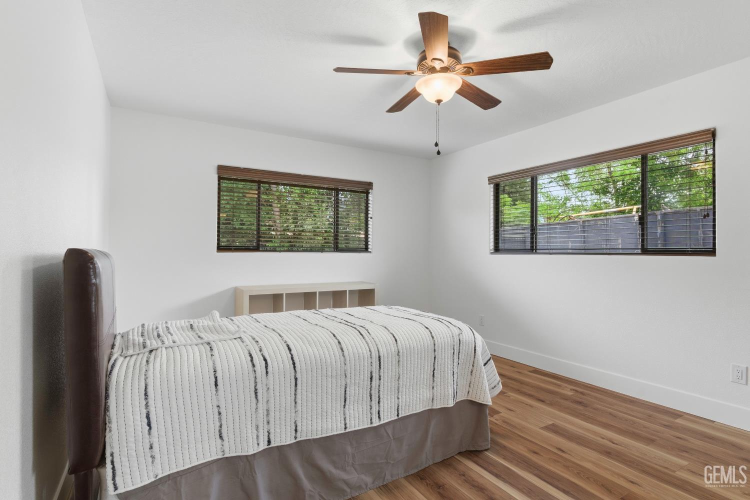 Undisclosed Address Springville, CA 93265 - Photo 36 of 62 a bedroom with a large bed and a window
