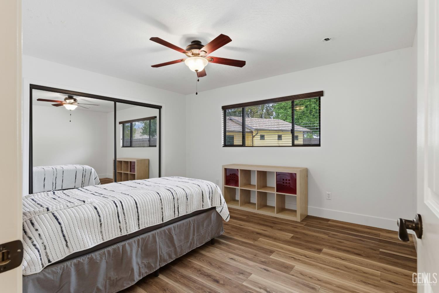 Undisclosed Address Springville, CA 93265 - Photo 42 of 62 a bedroom with a bed and a chandelier