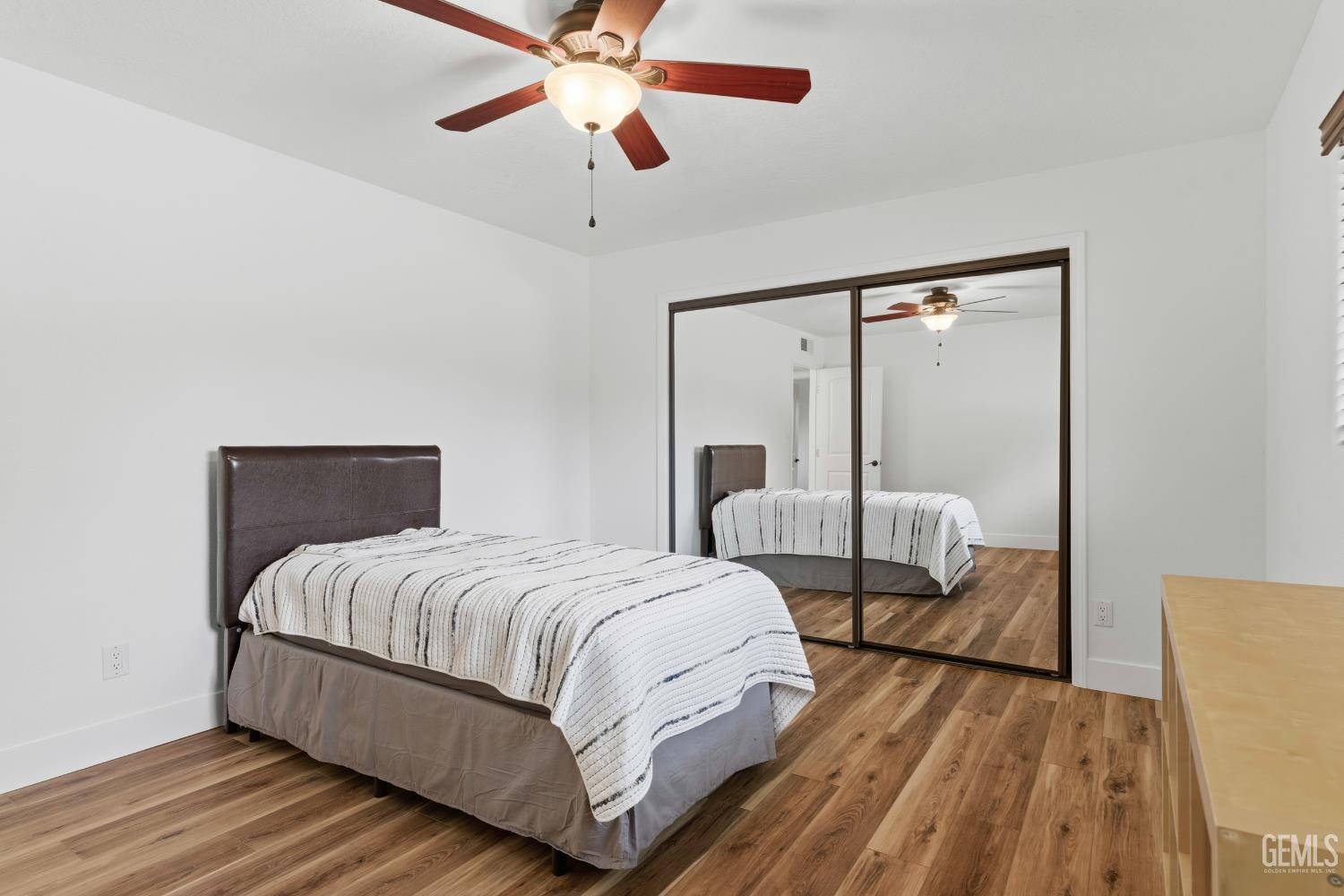 Undisclosed Address Springville, CA 93265 - Photo 43 of 62 a bedroom with a bed and wooden floor