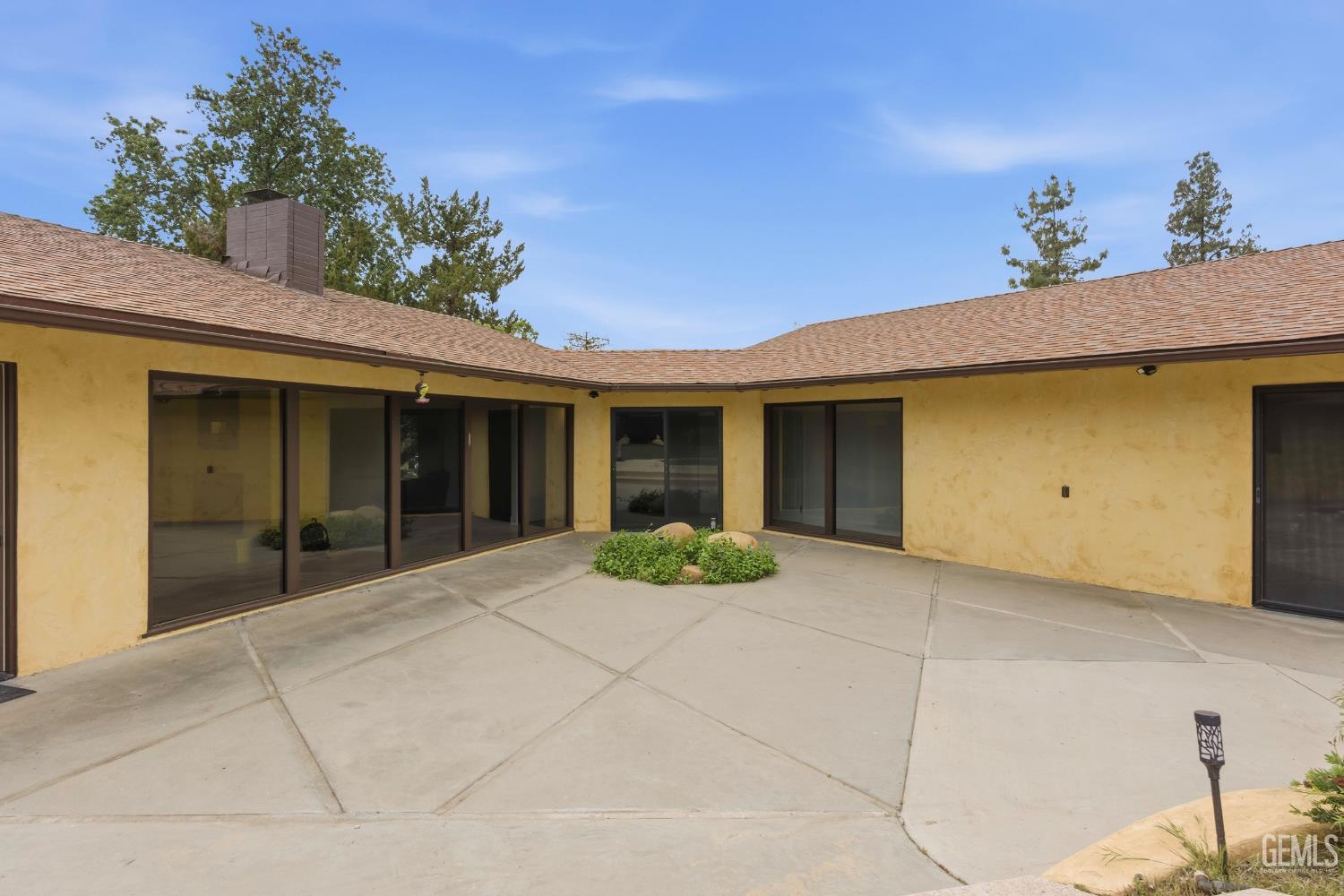 Undisclosed Address Springville, CA 93265 - Photo 46 of 62 a front view of a house with garden