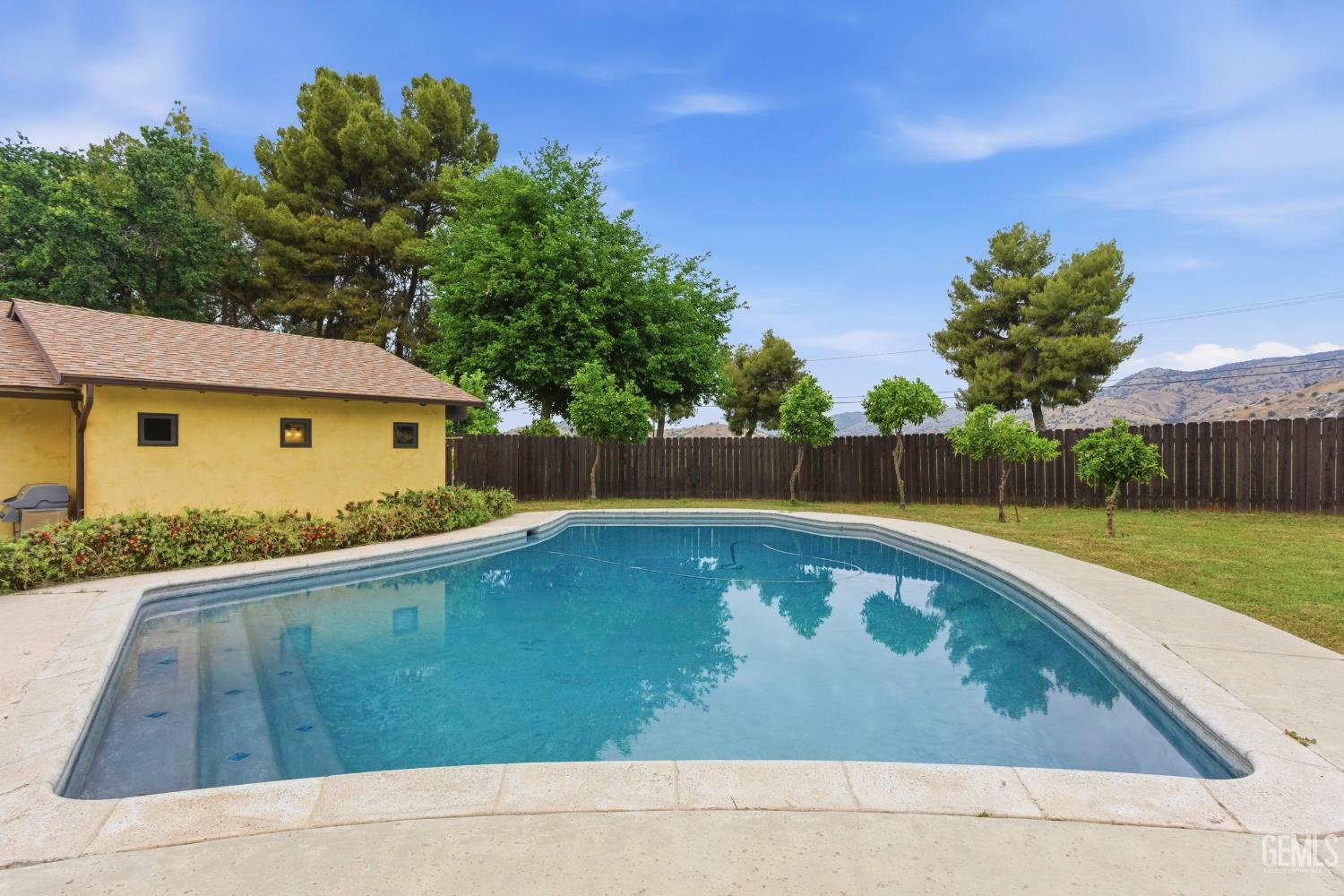 Undisclosed Address Springville, CA 93265 - Photo 51 of 62 a view of backyard with swimming pool and outdoor seating
