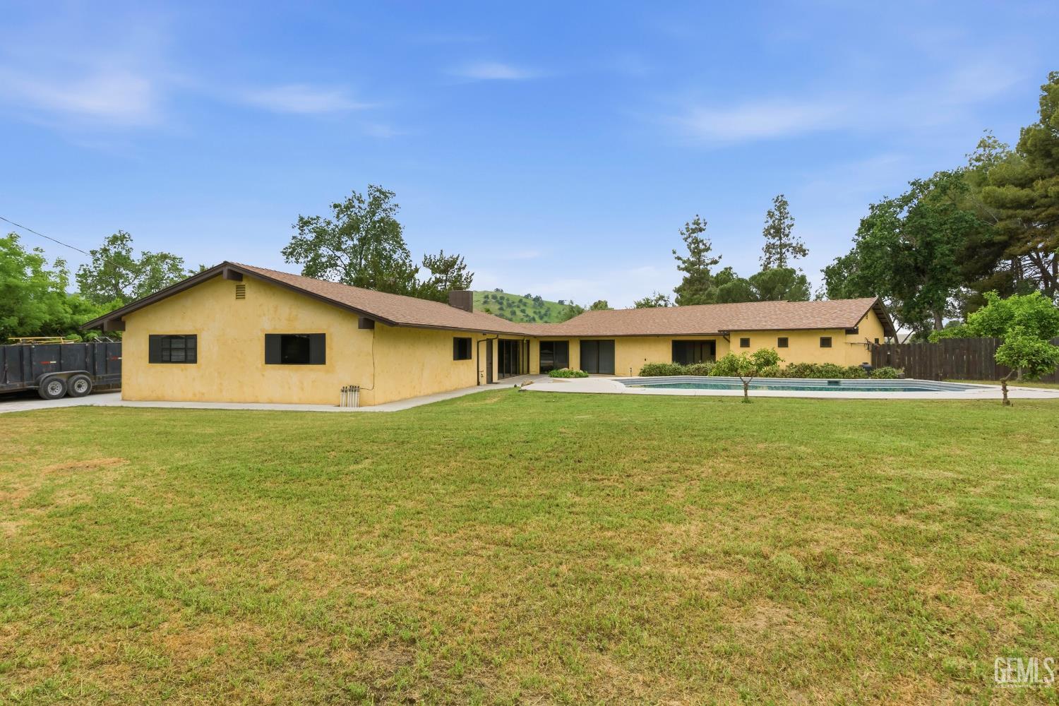 Undisclosed Address Springville, CA 93265 - Photo 55 of 62 a front view of house with yard and trees in the background