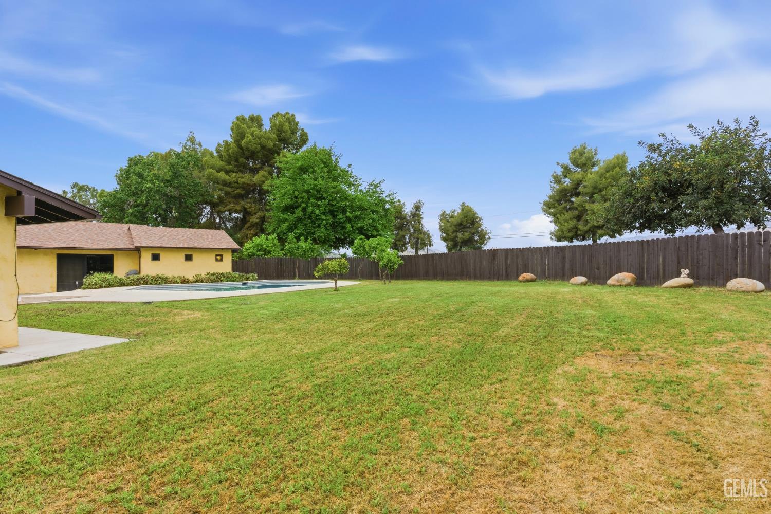 Undisclosed Address Springville, CA 93265 - Photo 56 of 62 a view of a house with a back yard