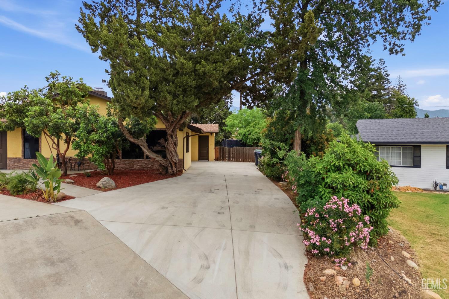 Undisclosed Address Springville, CA 93265 - Photo 58 of 62 a front view of a house with a yard