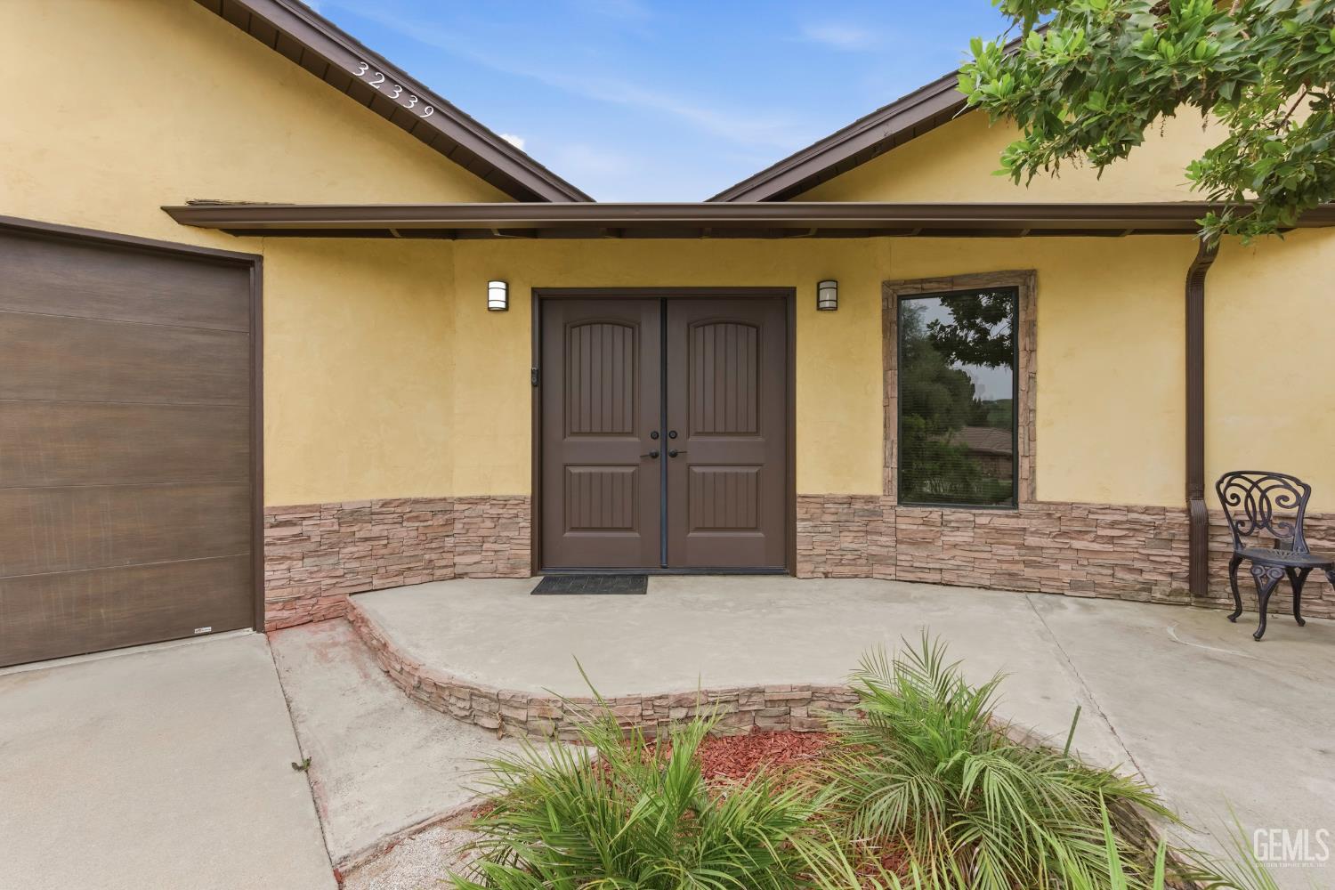 Undisclosed Address Springville, CA 93265 - Photo 6 of 62 a front view of a house with a yard