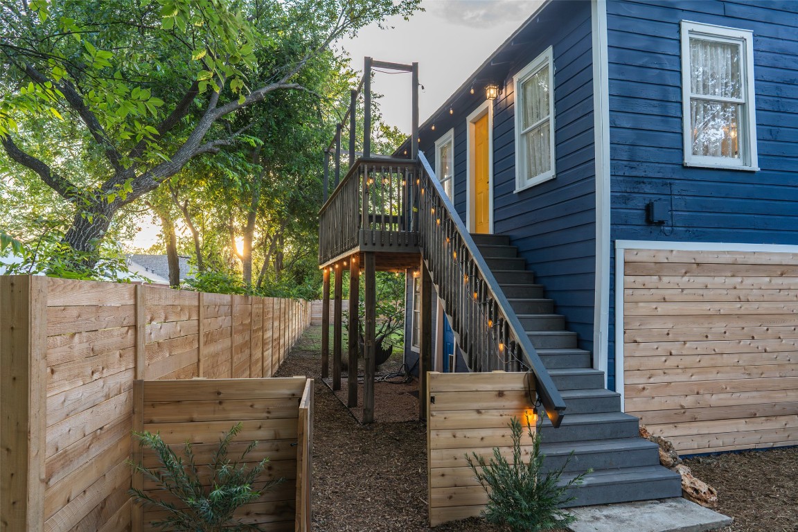 1148 Gunter Street Austin, TX 78721 - Photo 23 of 38 a view of a brick house with a small yard