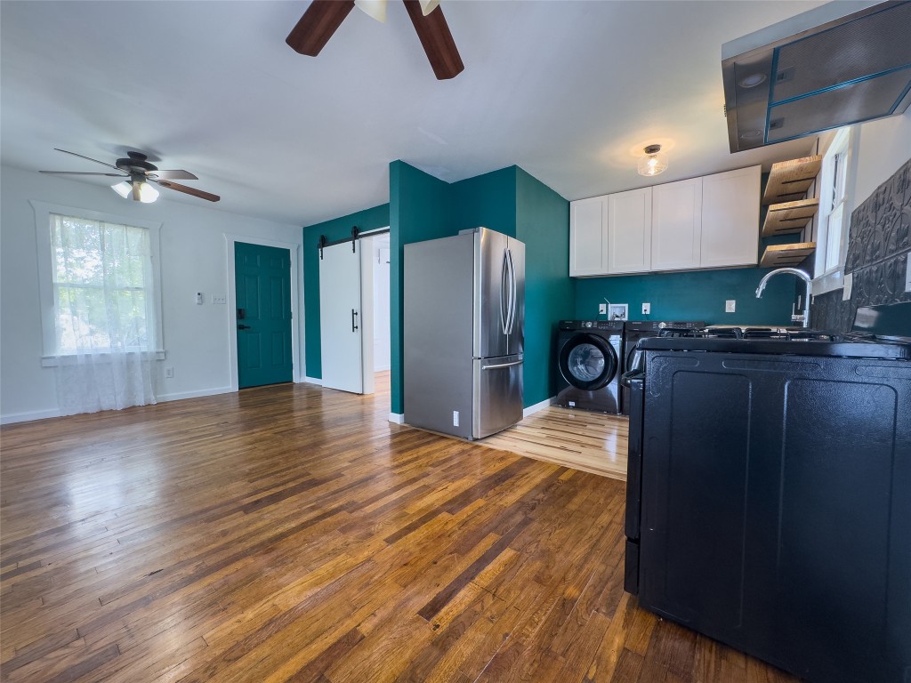 1148 Gunter Street Austin, TX 78721 - Photo 25 of 38 a view of a kitchen with furniture and a window