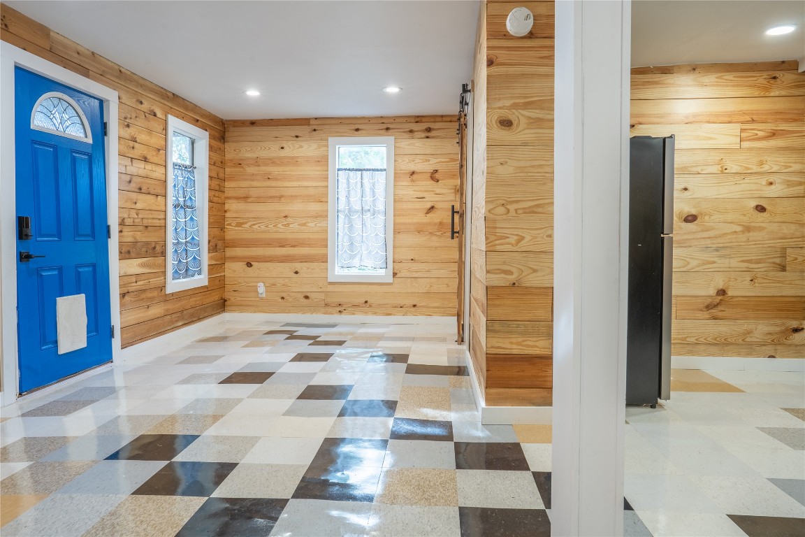 1148 Gunter Street Austin, TX 78721 - Photo 33 of 38 a bathroom with a glass door shower