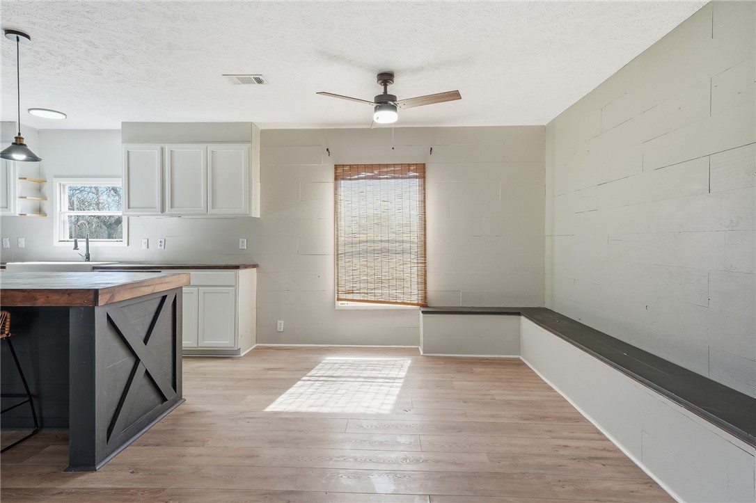 124 County Road 632 Sinton, TX 78387 - Photo 14 of 40 a kitchen with a sink cabinets and window