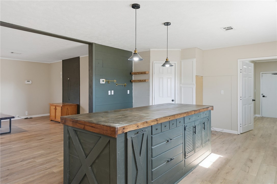 124 County Road 632 Sinton, TX 78387 - Photo 16 of 40 a bathroom with a granite countertop sink a large mirror and a shower