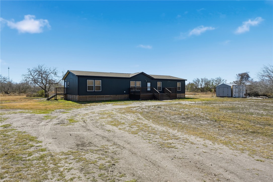 124 County Road 632 Sinton, TX 78387 - Photo 2 of 40 a front view of a house with a yard