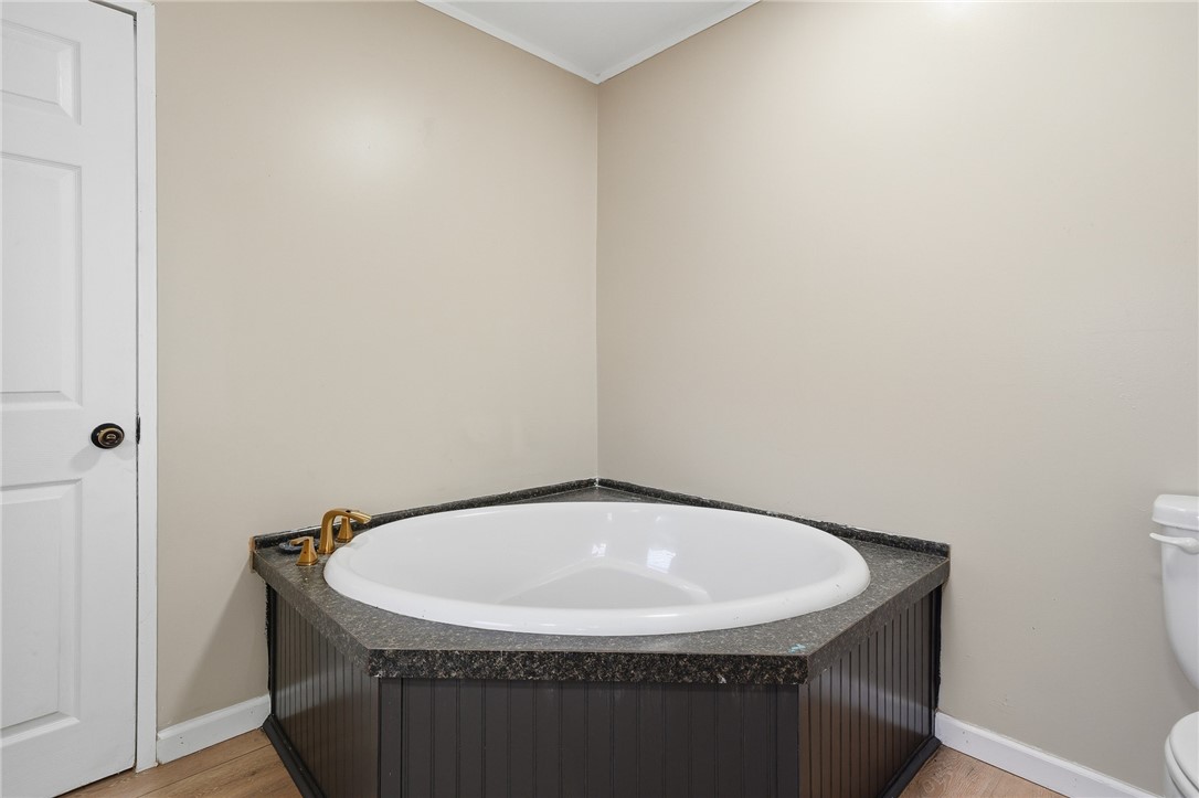 124 County Road 632 Sinton, TX 78387 - Photo 22 of 40 a bathroom with a sink and a mirror