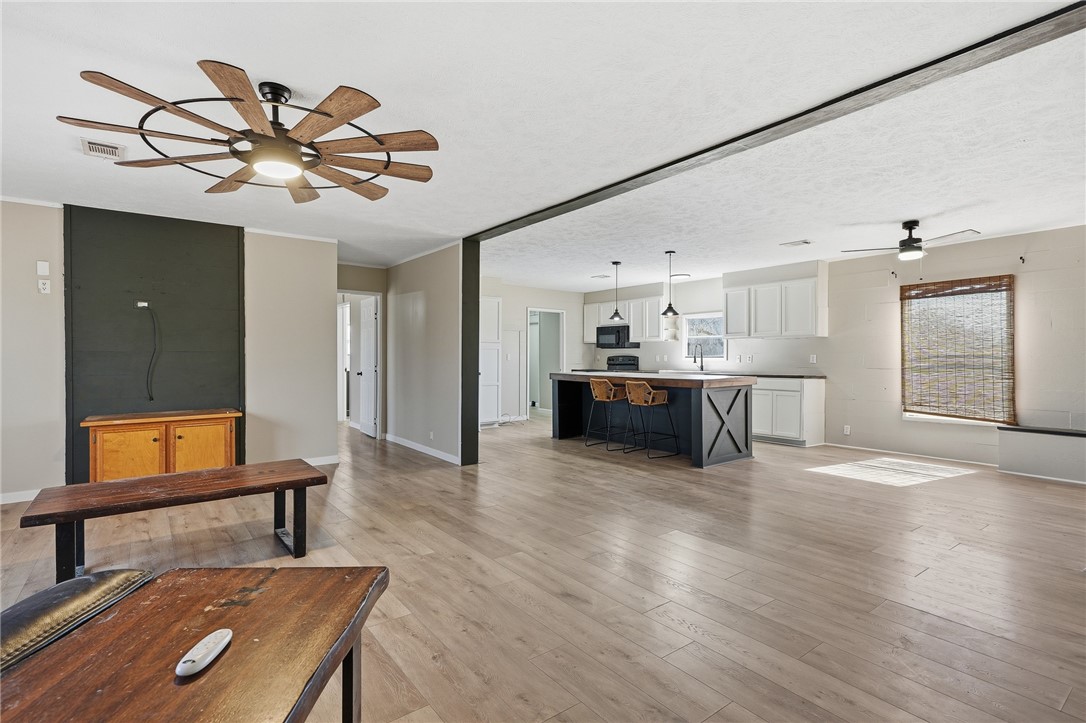 124 County Road 632 Sinton, TX 78387 - Photo 4 of 40 a view of a livingroom with a kitchen