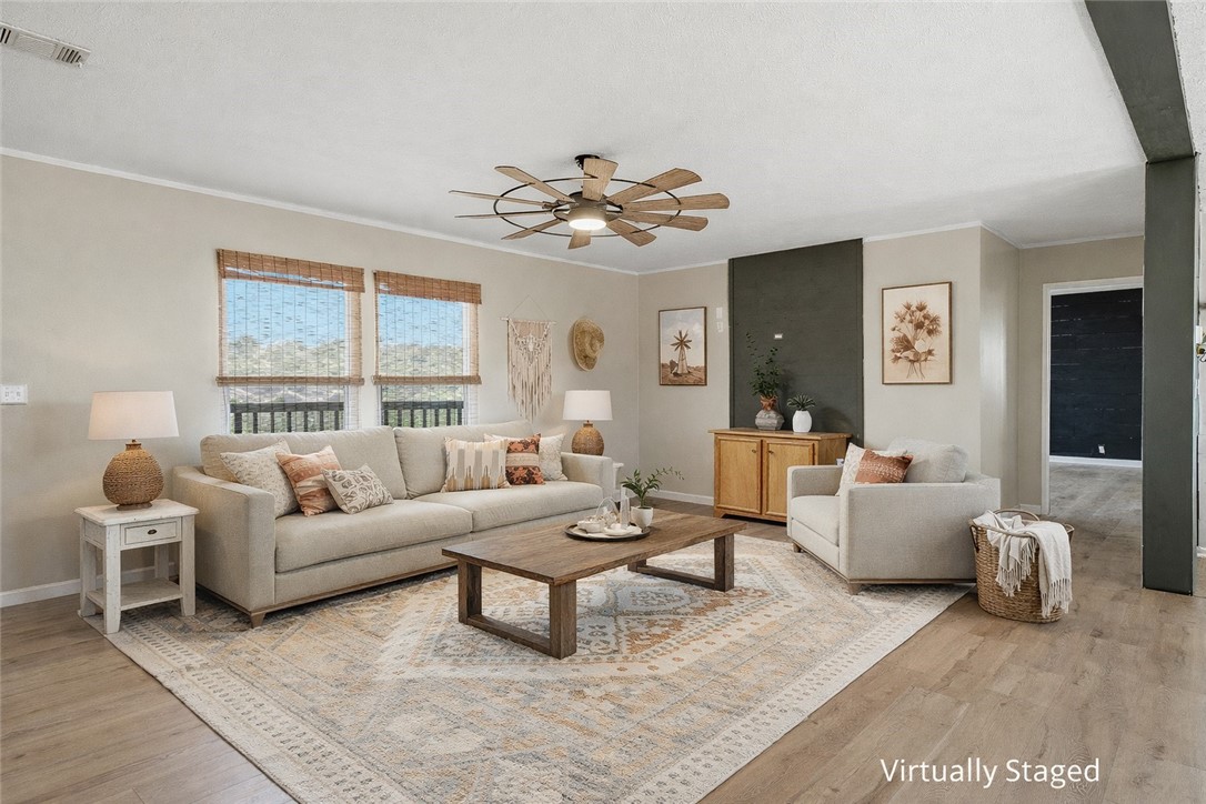 124 County Road 632 Sinton, TX 78387 - Photo 6 of 40 a living room with furniture and a large window