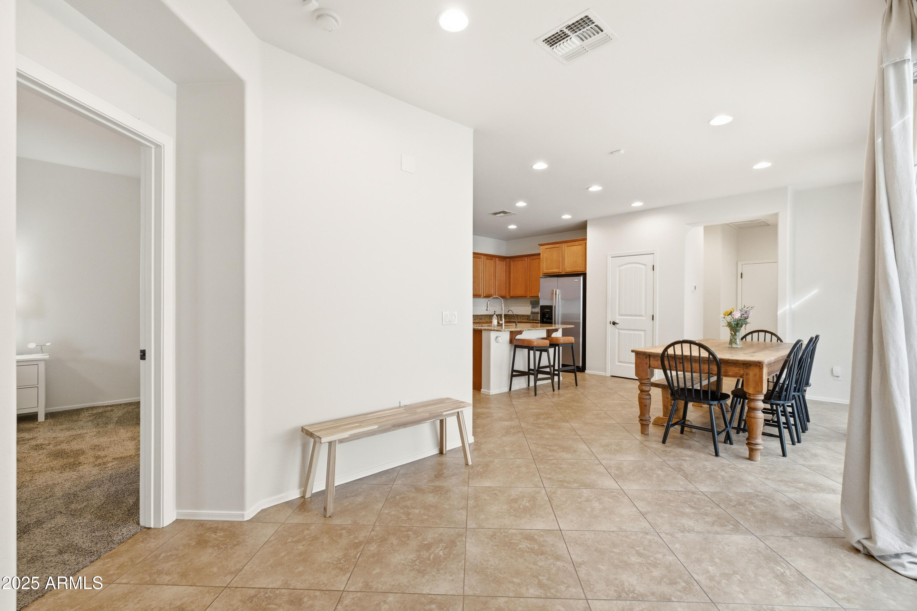 4495 East Woodside Way Gilbert, AZ 85297 - Photo 15 of 80 a view of a dining room with furniture