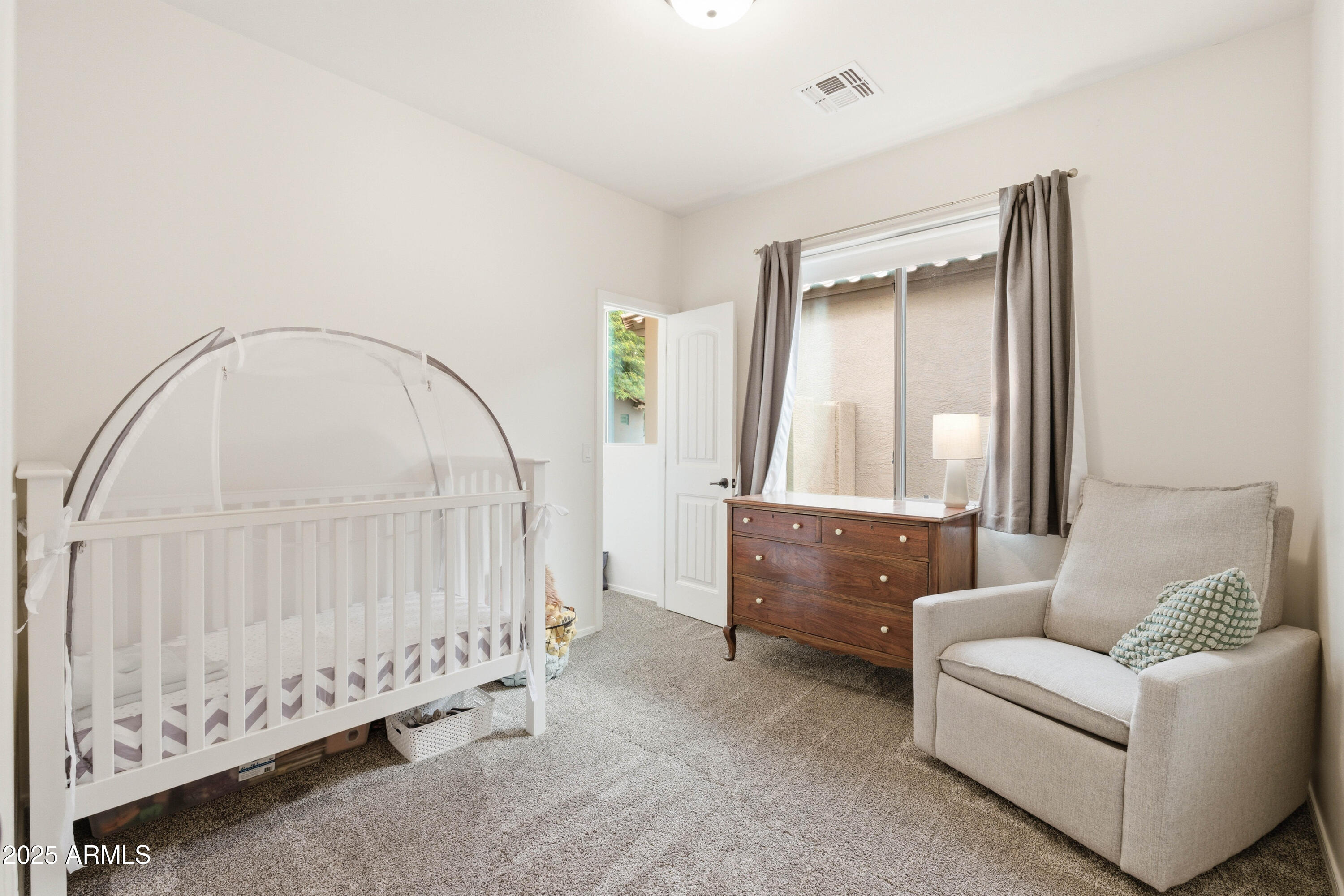 4495 East Woodside Way Gilbert, AZ 85297 - Photo 32 of 80 a living room with furniture and a window