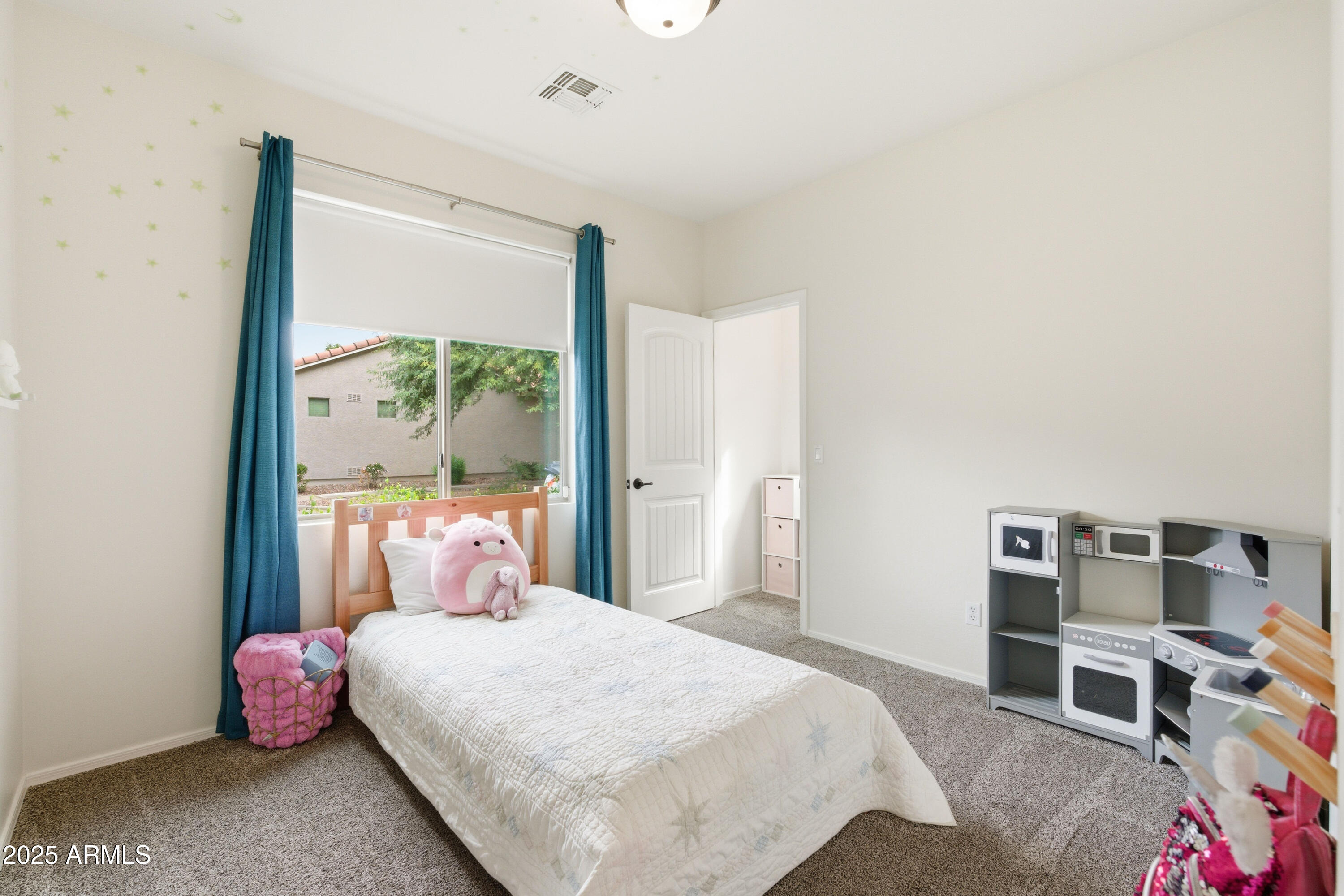 4495 East Woodside Way Gilbert, AZ 85297 - Photo 33 of 80 a bedroom with a bed and a window