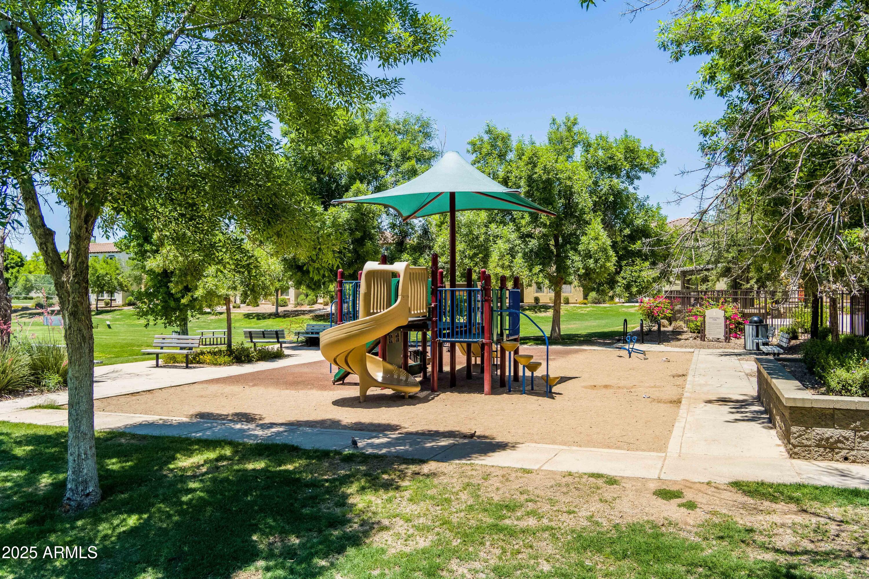 4495 East Woodside Way Gilbert, AZ 85297 - Photo 54 of 80 a view of a park with swings and slides