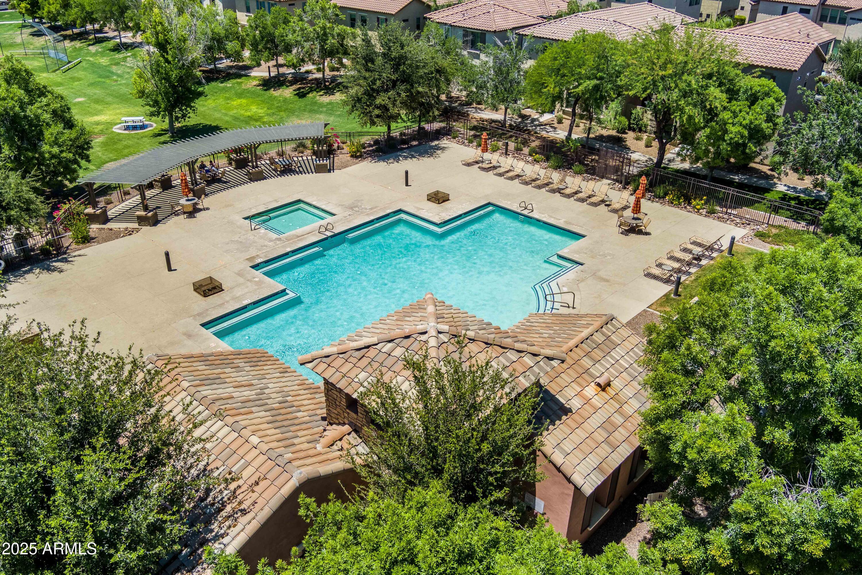 4495 East Woodside Way Gilbert, AZ 85297 - Photo 57 of 80 an aerial view of a house with a garden and lake view