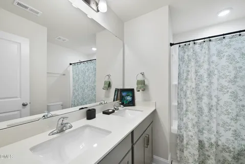 a kitchen with a stove and a microwave
