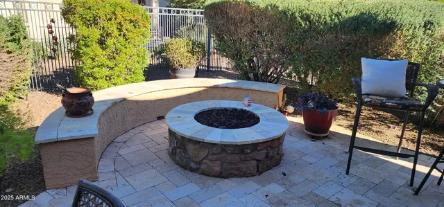 a view of a grassy field with an ocean