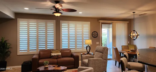 a living room with furniture and a window