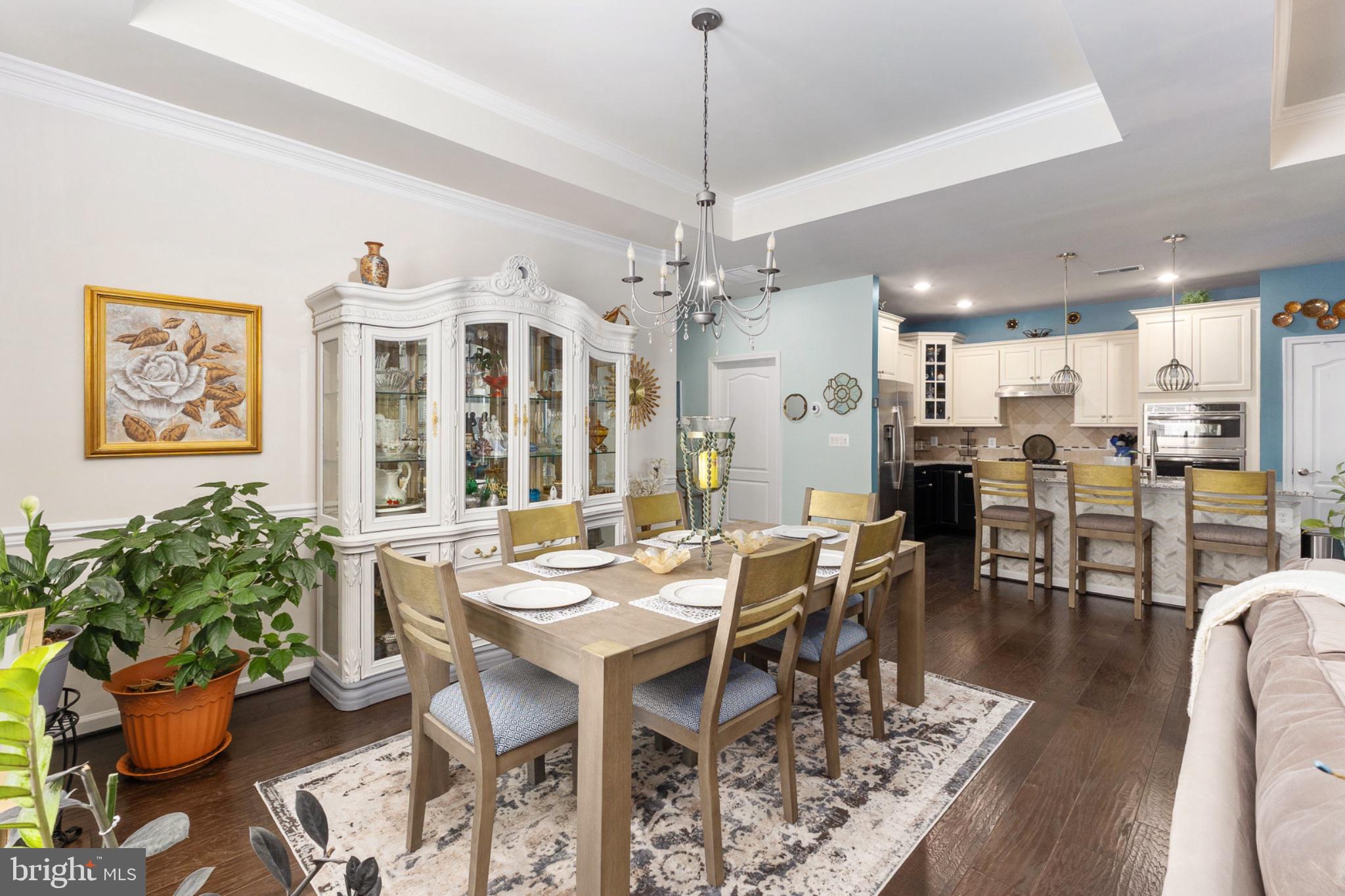 6012 New Berne Road Fredericksburg, VA 22407 - Photo 16 of 41 a view of a dining room with furniture and a chandelier