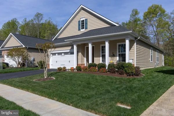 a house view with a garden space
