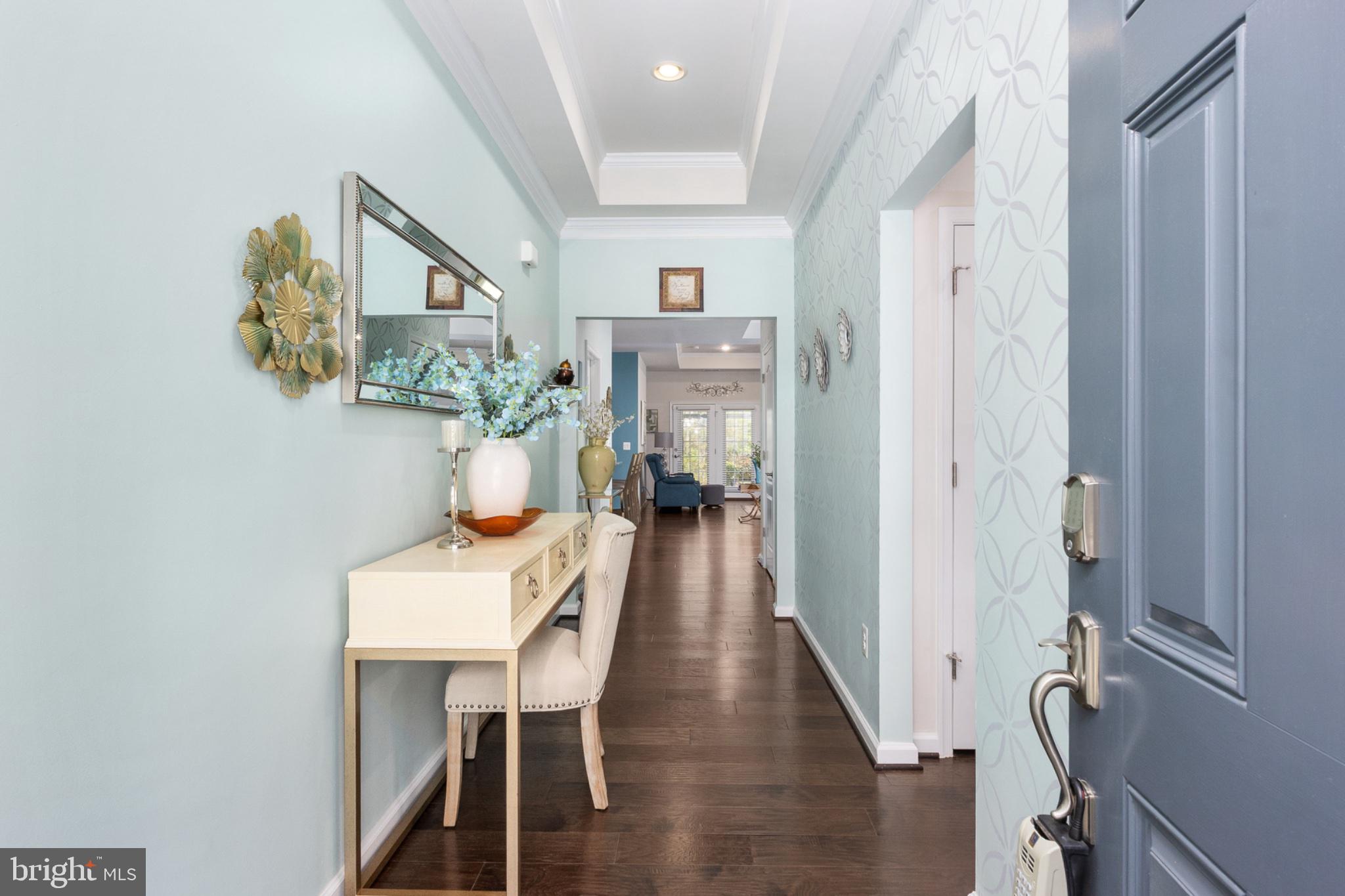6012 New Berne Road Fredericksburg, VA 22407 - Photo 8 of 41 a view of a hallway with furniture and wooden floor