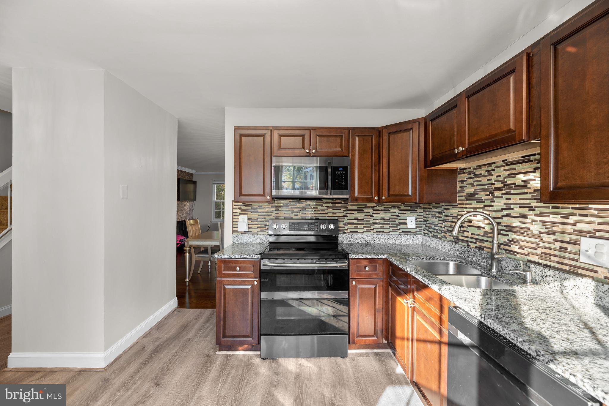 8490 Snowden Oaks Place Laurel, MD 20708 - Photo 6 of 28 Kitchen