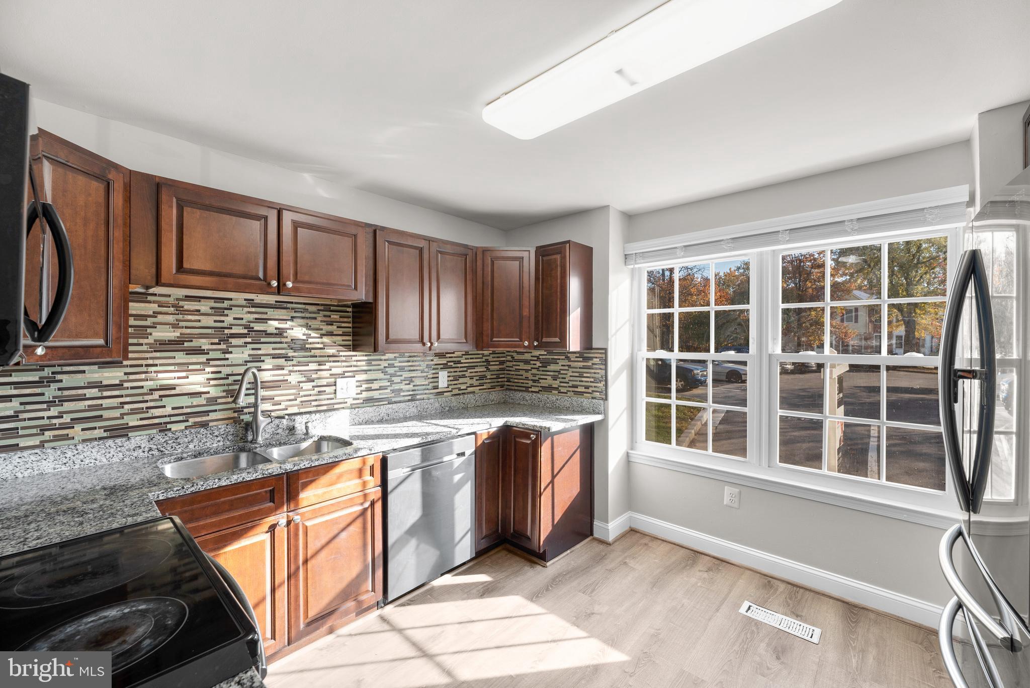 8490 Snowden Oaks Place Laurel, MD 20708 - Photo 7 of 28 Kitchen